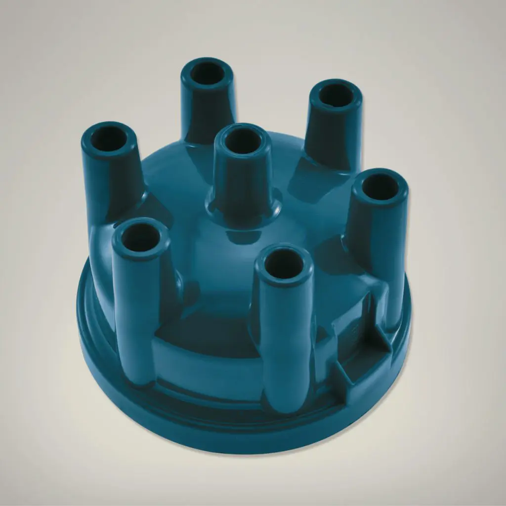 A blue distributor cap Distributor Cap. EP8104 Replaces: DDB130 JLM150 45155