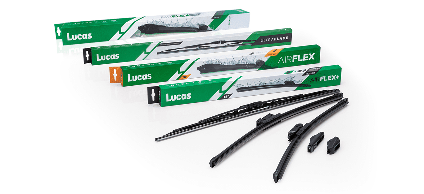 Four boxes of Lucas windshield wipers labeled "ULTRABLADE," "AIRFLEX," and "AIRFLEX+," arranged in a staggered layout with wipers and attachments displayed in front.