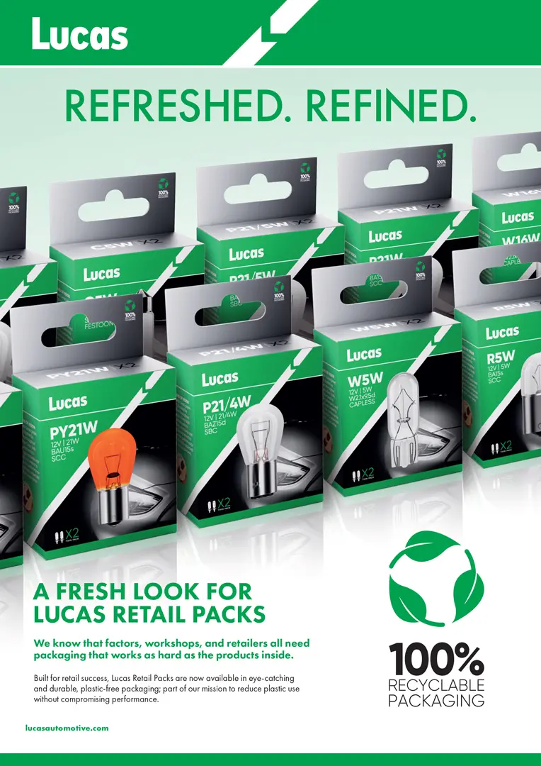 Display of multiple Lucas automotive bulb retail packs arranged in rows, featuring green and silver packaging with bulb illustrations, alongside text announcing refreshed packaging and a 100% recyclable packaging symbol.