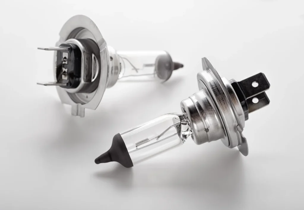 Two automotive bulbs on a white background. 